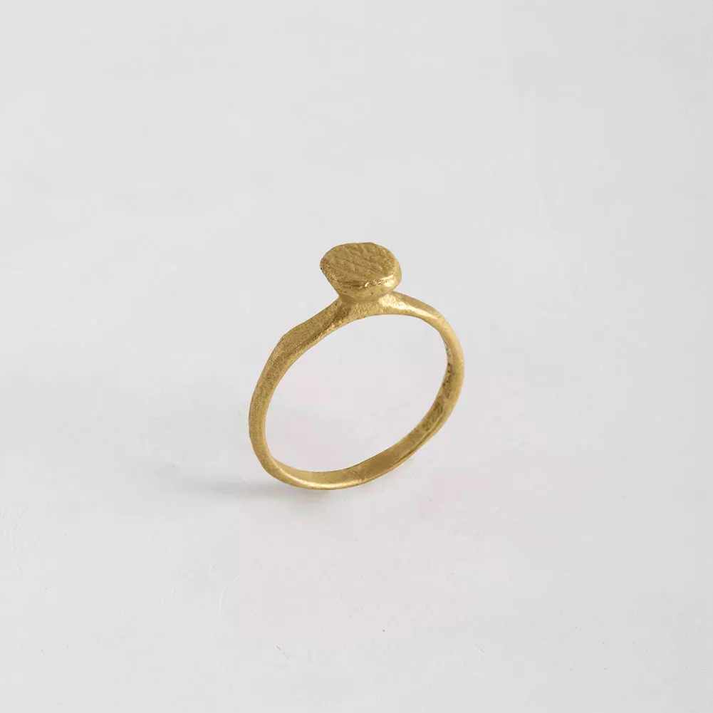 The iron nail is the beating-heart of this delicate ring. No longer a casual object, it is now an...