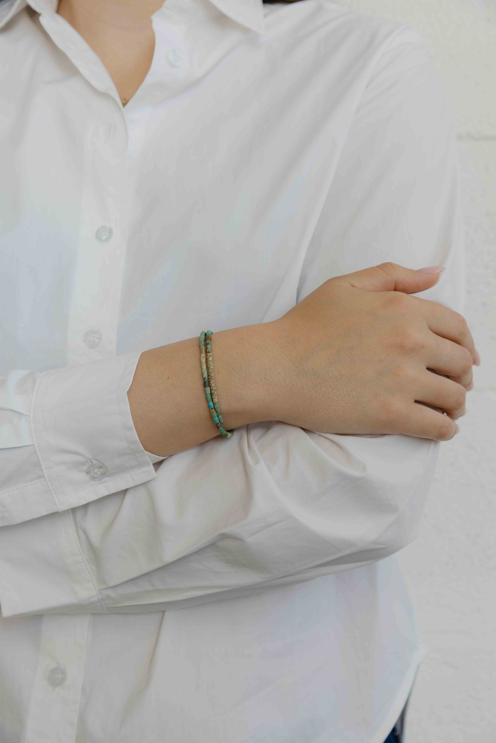 Delicate Turquoise gemstones are combined with rugged folded gold links and a handcrafted gold cl... - View 2