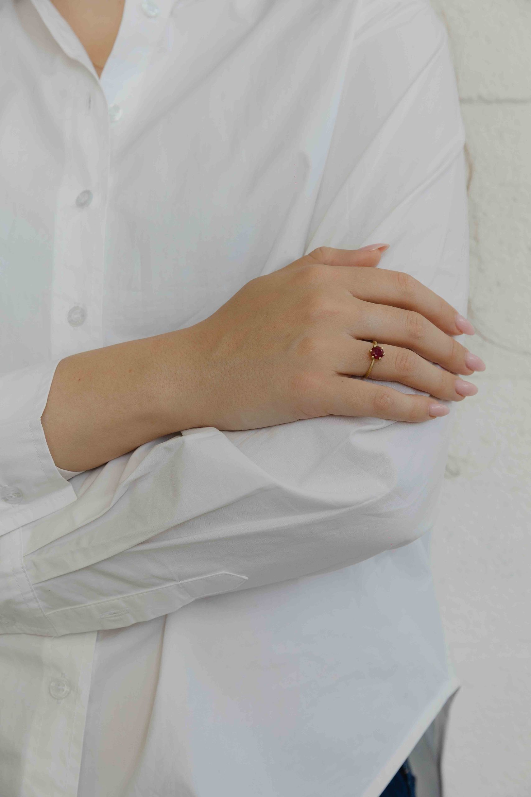 A thin, hoop ring with a setting for a stone or a diamond. The gem shines in its full glory, expo... - View 3