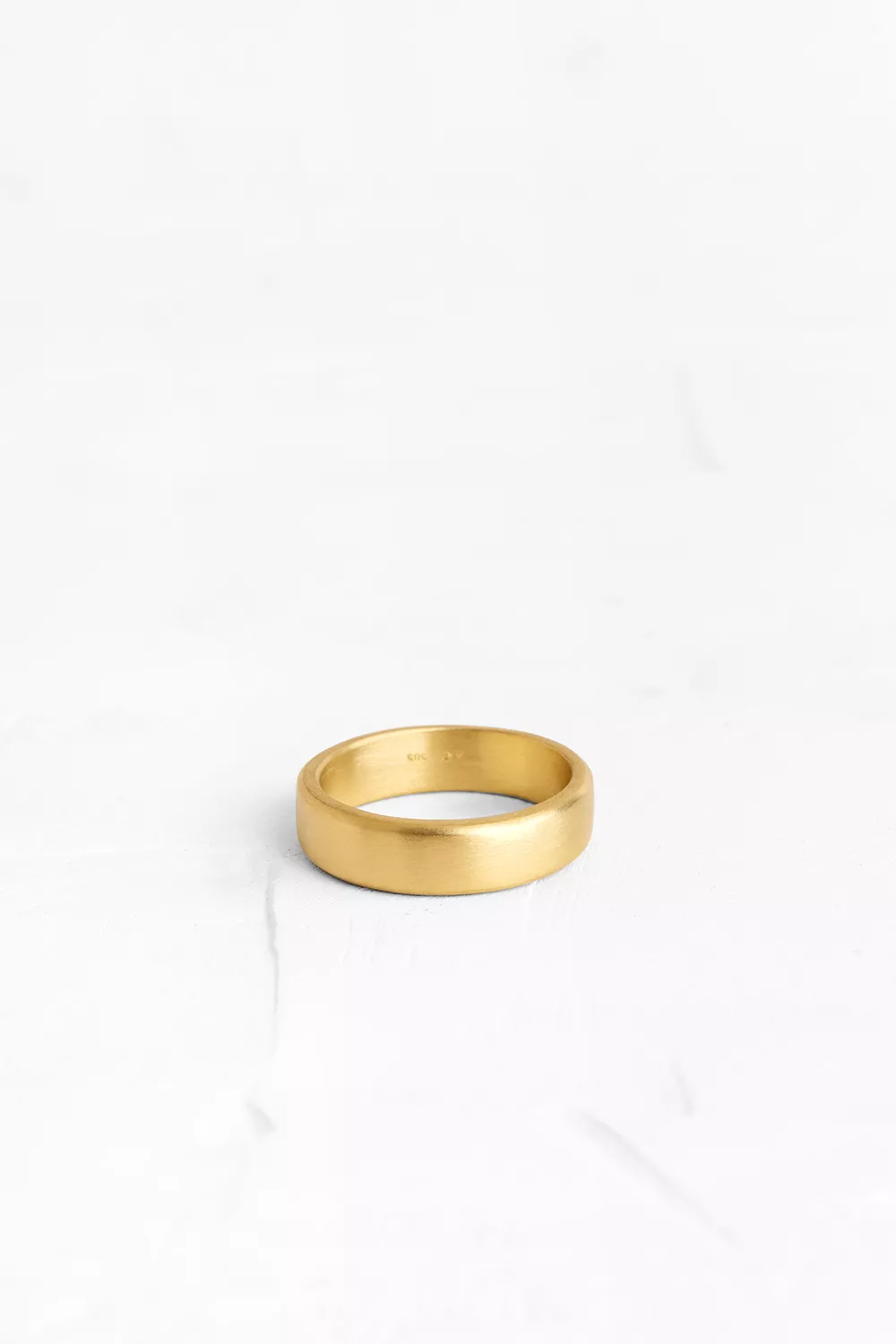 This Thick gold band sits light on the hand. Available also in a more narrow version.&nbsp;
