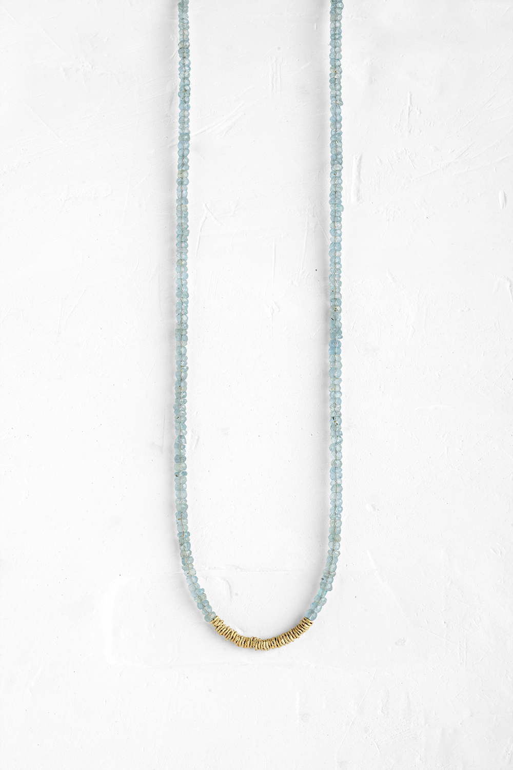 Delicate Aqua Marine gemstones are combined with rugged, folded gold links and a handcrafted gol... - View 2