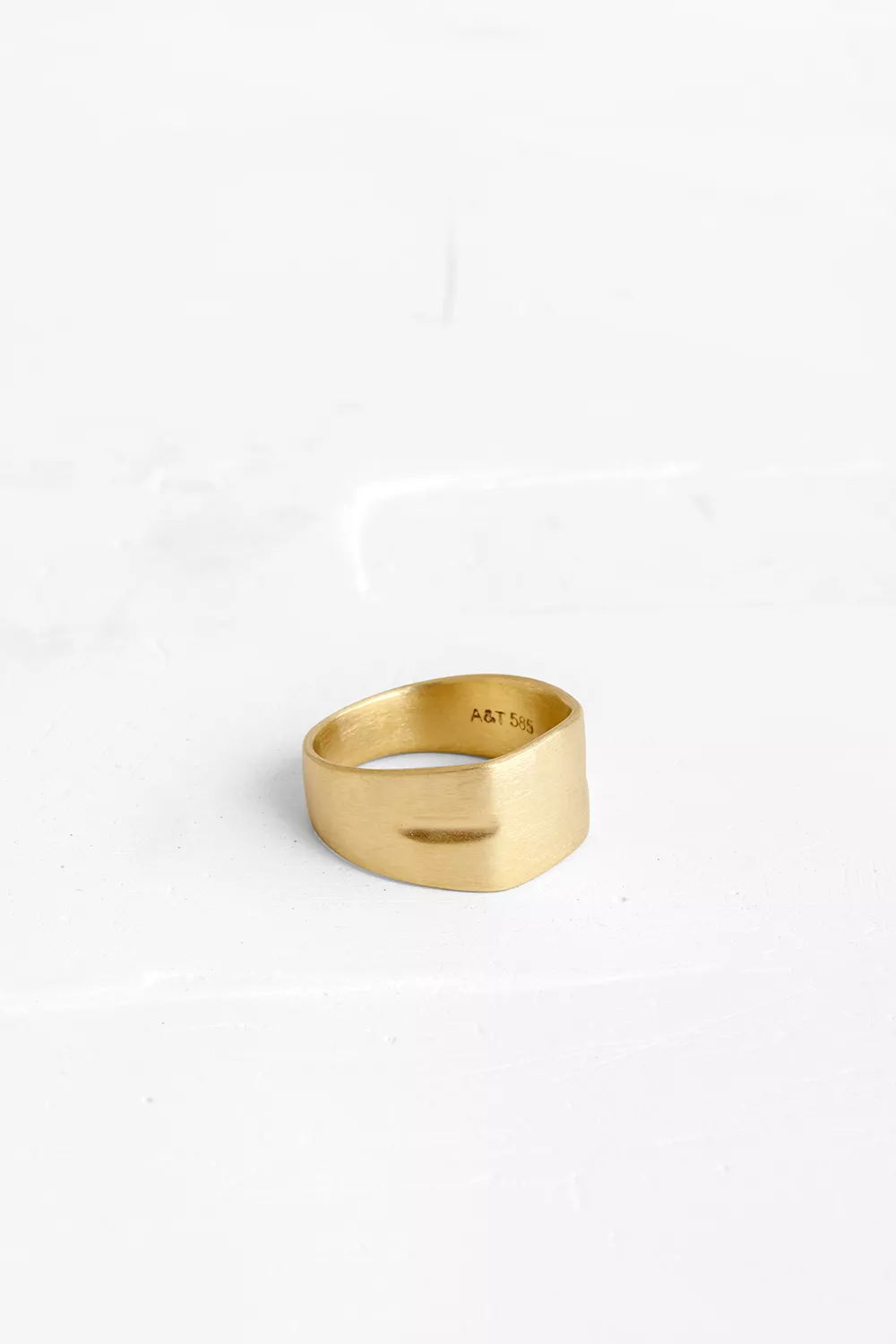 A signet ring with a dominant presence & embedded element on the sides Like a personal and valuab...