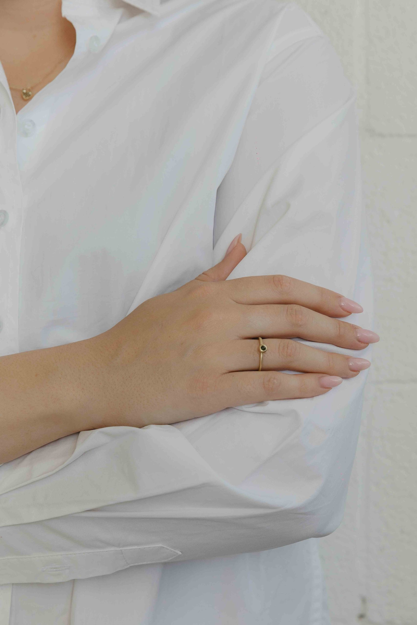 A handmade element in the shape of a hollow ball is set on top of the band, in which a small Gree... - View 3