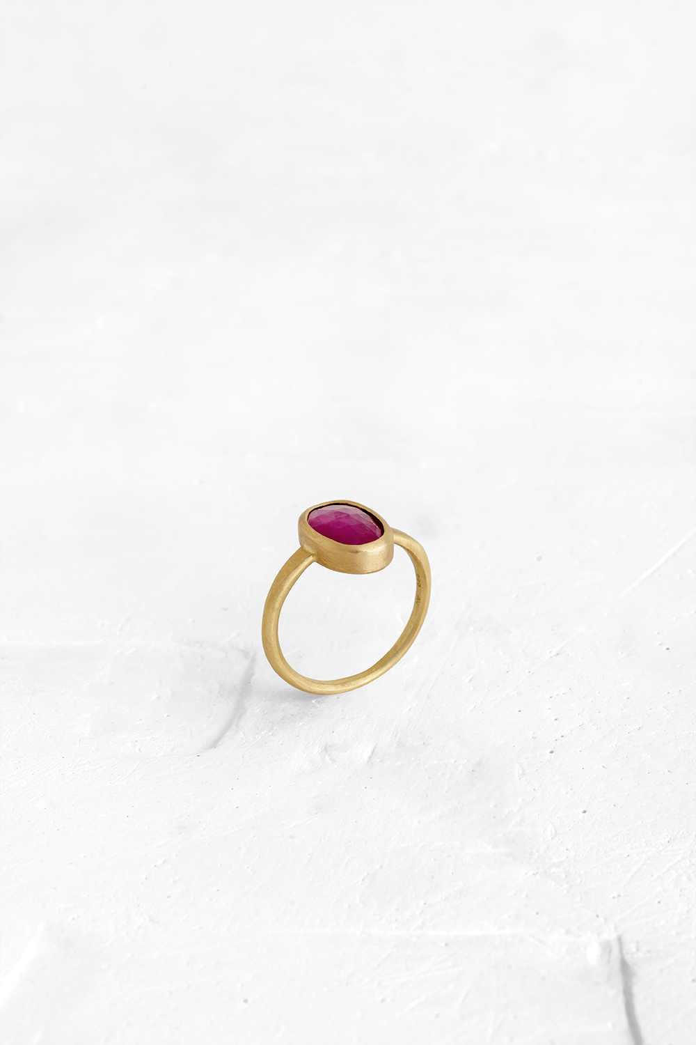 This 14K gold ring has an elegant style set with an oval Pink Sapphire - View 2