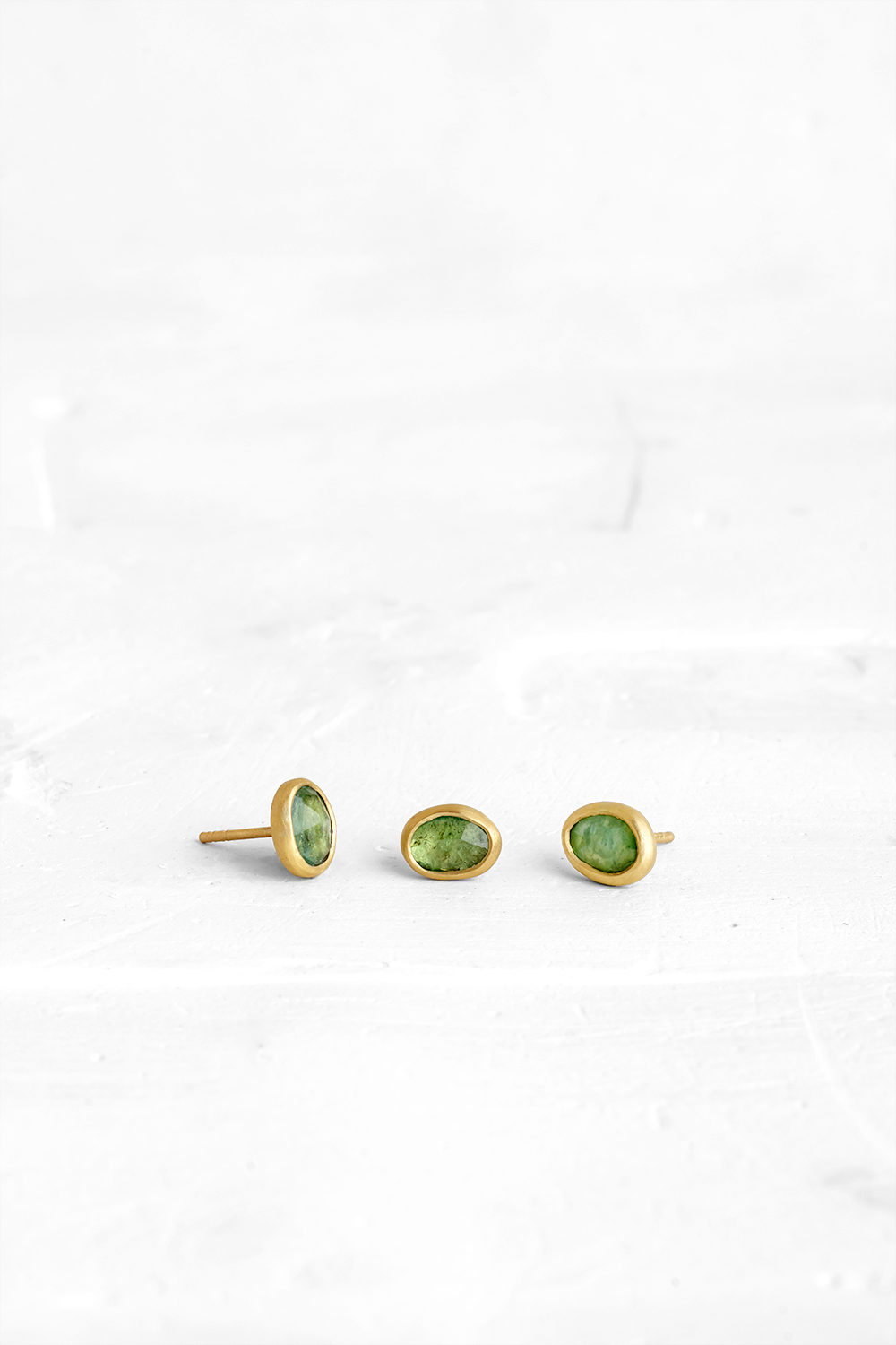 One of a kind single earring set with an amorphous Emerald
** Each earring is different
** The ...