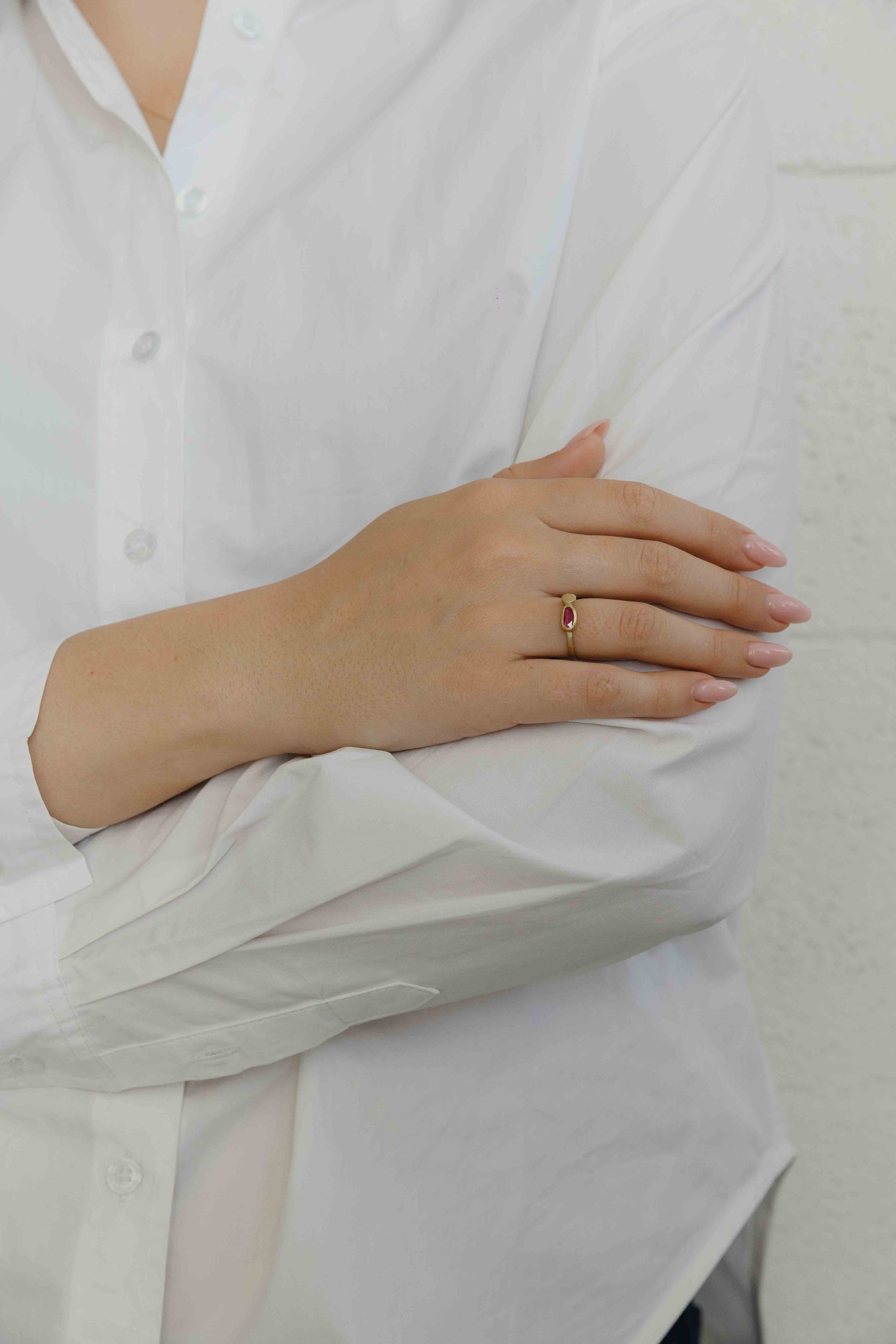 A gentle gold ring set with a slice of Diamante and a gold element coexisting side by side.
Each... - View 6