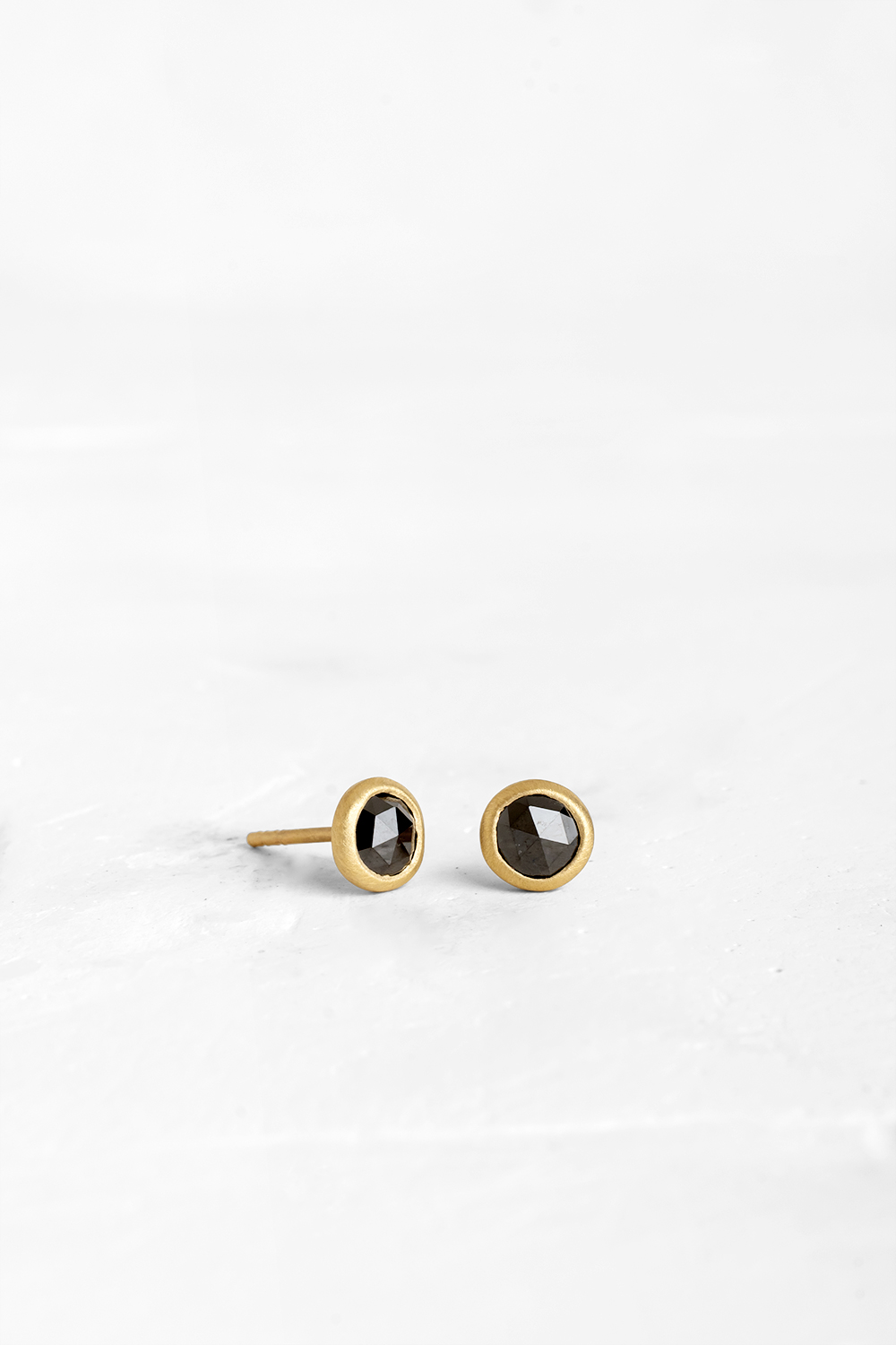 A Black Diamonds stud earrings wrapped in 18K gold
** Each earring is different
** The price is... - View 2